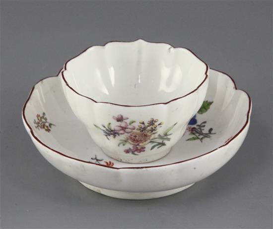 A Chelsea petal lobed tea bowl and saucer, c.1755, saucer 11cm